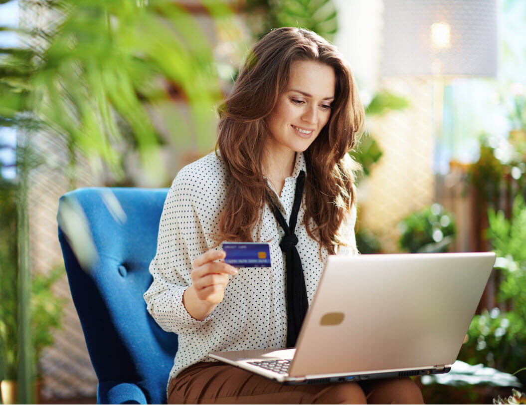 girl shopping with a credit card online