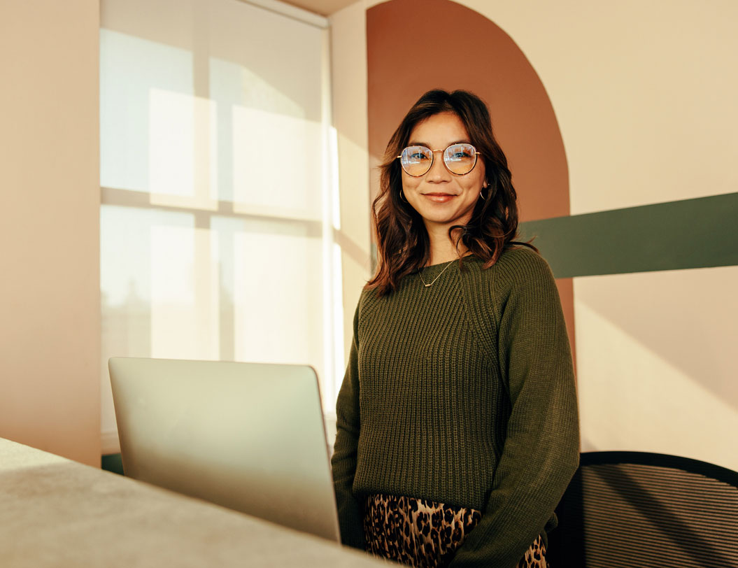 Young receptionist smiling