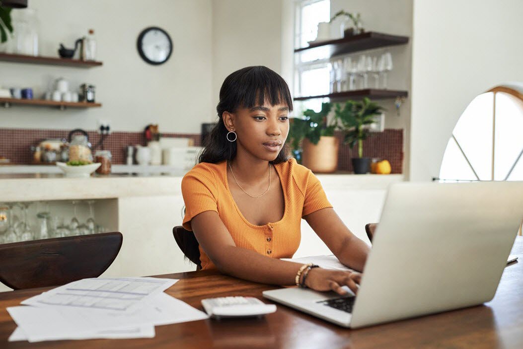 Woman at desktop computer