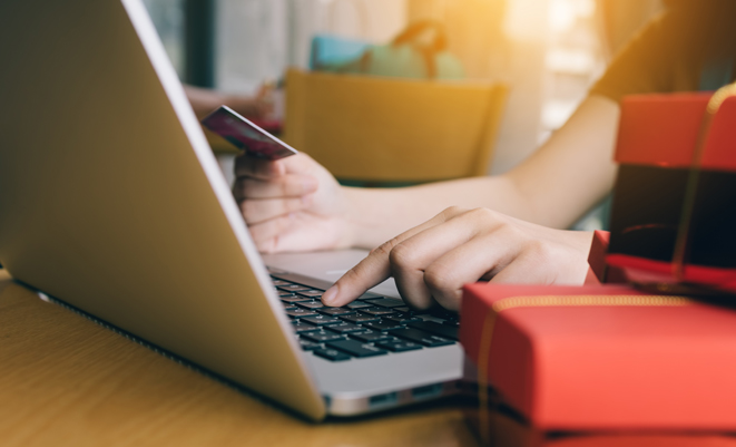 Person shopping on their laptop