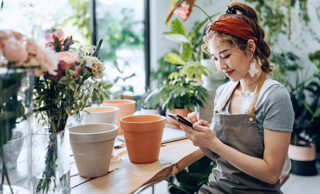 Florist on her mobile device